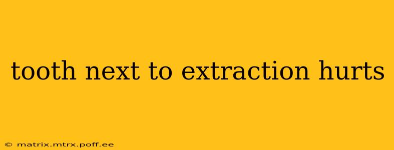tooth next to extraction hurts